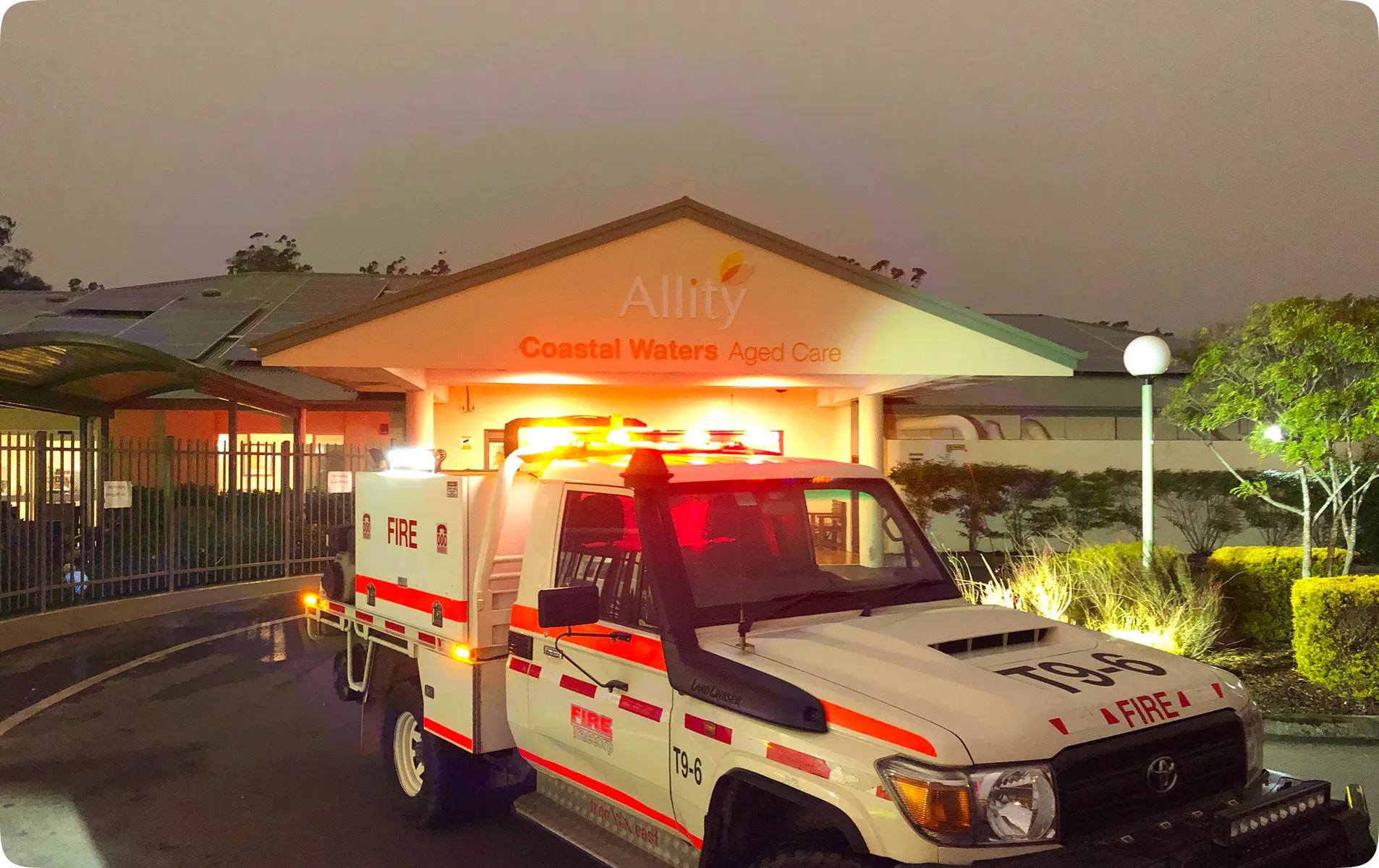 Fire service vehicle outside an aged care home at night